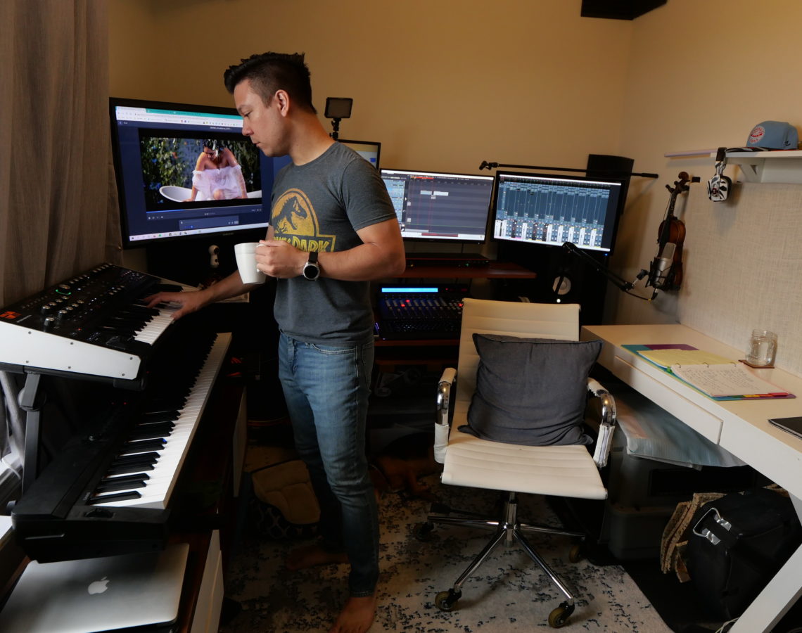 Film Composer Tim Corpus writing in his studio