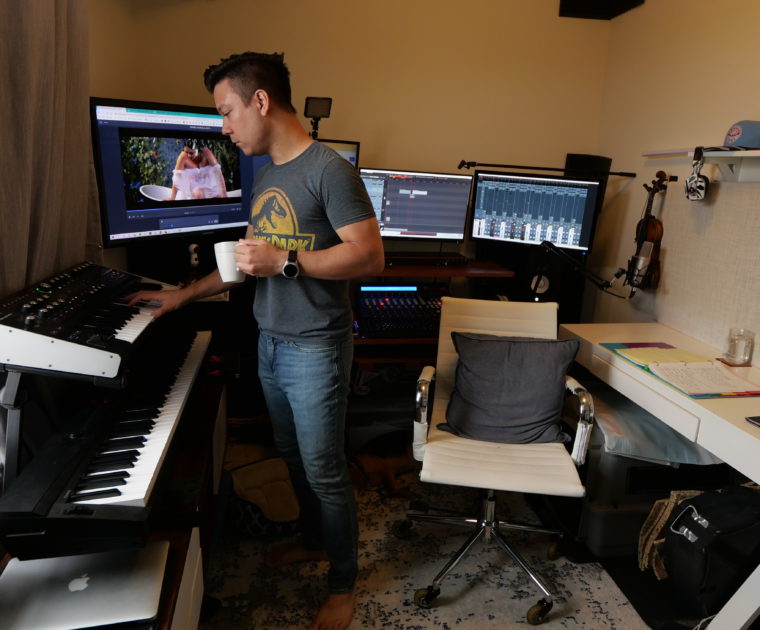 Film Composer Tim Corpus writing in his studio